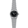 The TUDOR Royal is a stainless steel and gold wristwatch featuring a black dial, Roman numeral hour markers, and a five-link bracelet—an iconic automatic sport-chic timepiece.
