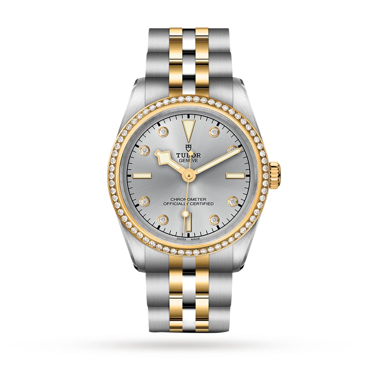 A TUDOR Black Bay One 31 S&G wristwatch with a silver dial, yellow gold markers, diamond bezel, and a stainless steel and gold bracelet is displayed on a white background.