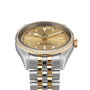 The TUDOR Black Bay One 36 S&G is a luxury wristwatch with a gold and silver band, diamond bezel, and yellow gold dial adorned with diamond hour markers.