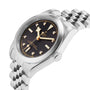 The TUDOR Black Bay 31 is a unisex chic stainless steel watch with a black dial, gold hour markers, diamond accents, and a silver bracelet—reflecting the elegant style of the Black Bay collection.