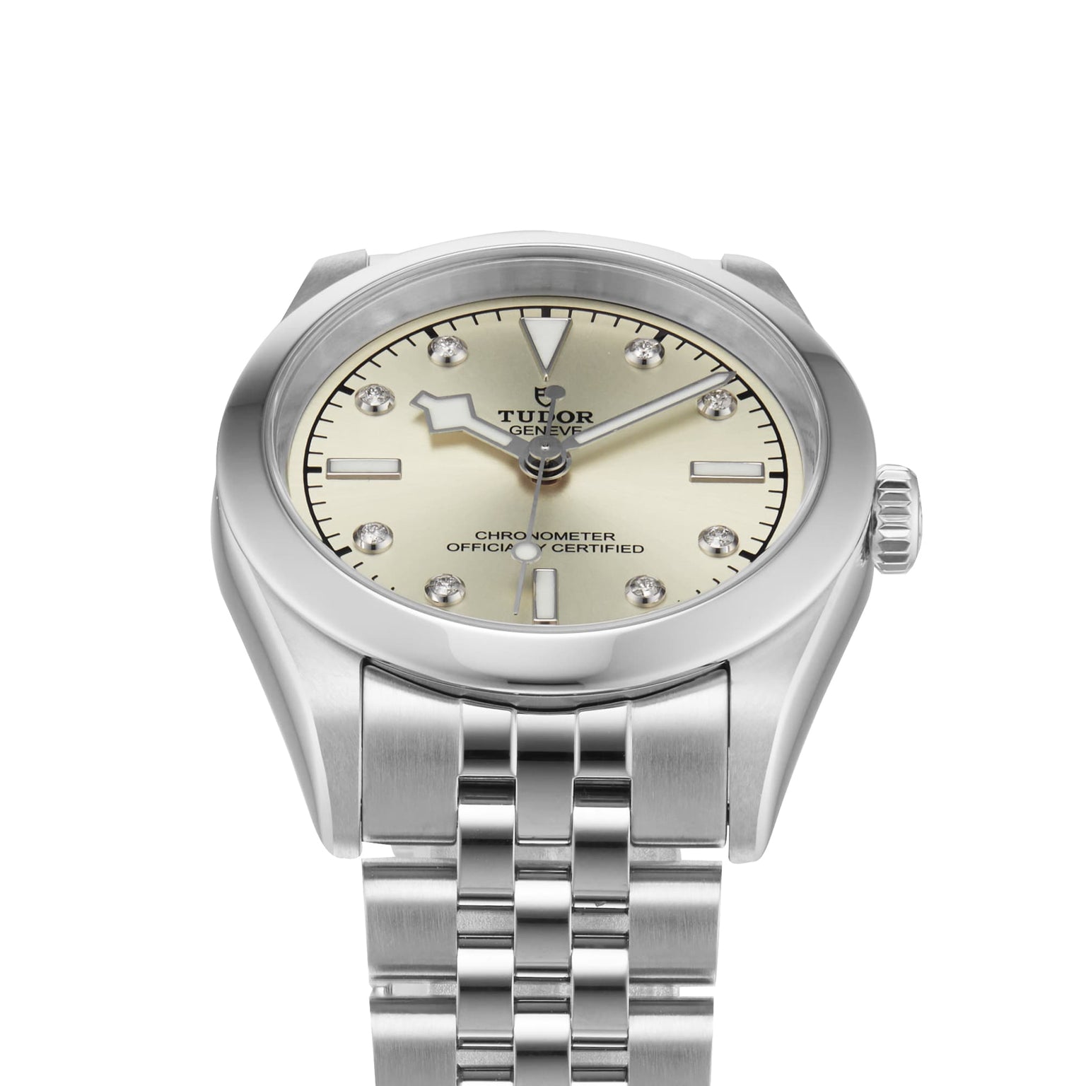 The TUDOR Black Bay One 31, a silver unisex wristwatch with a cream dial, diamond hour markers, and stainless steel bracelet, blends technical refinement with the chic elegance signature to Black Bay models.