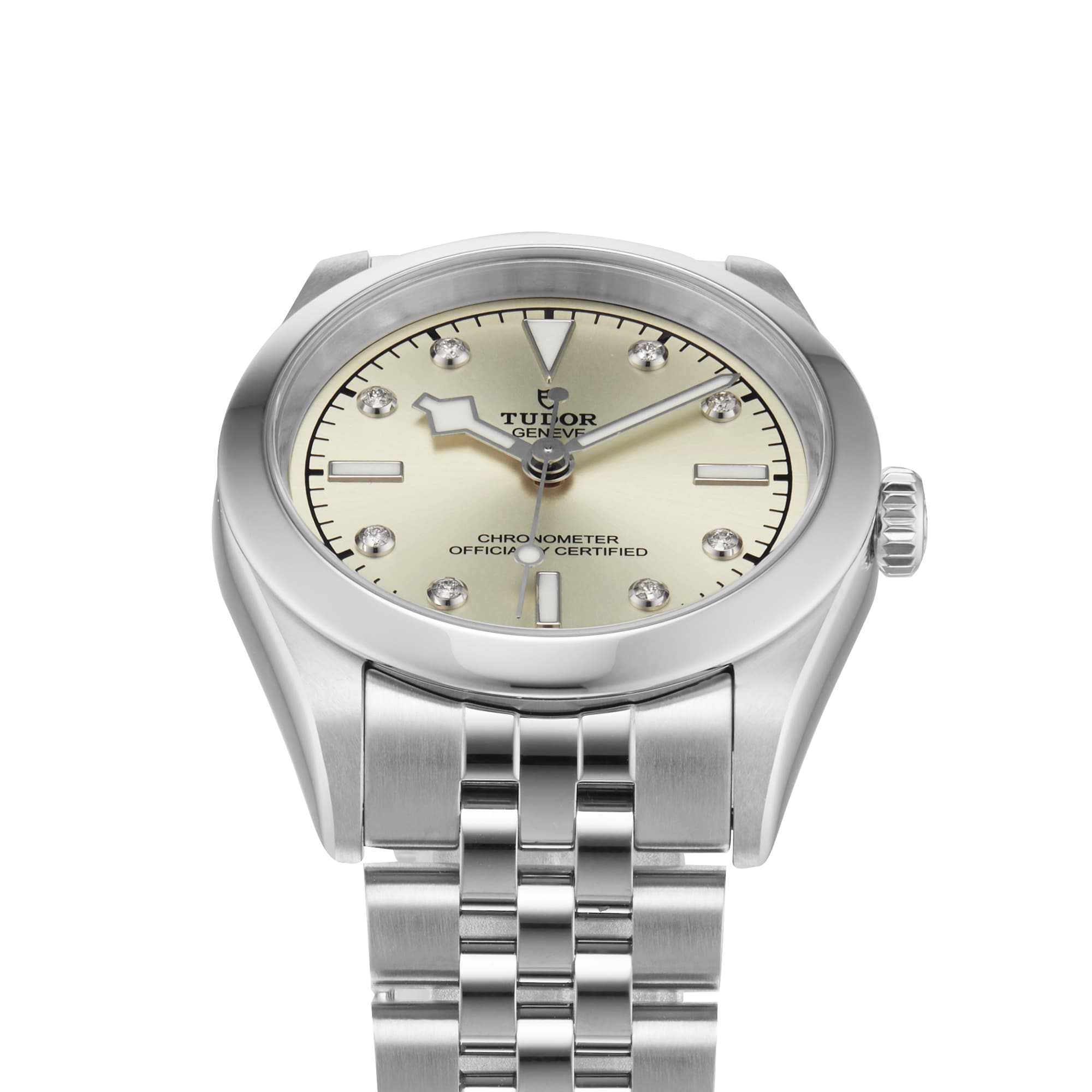 The TUDOR Black Bay One 31, a silver unisex wristwatch with a cream dial, diamond hour markers, and stainless steel bracelet, blends technical refinement with the chic elegance signature to Black Bay models.