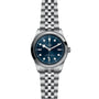 A TUDOR Black Bay One 41 stainless steel wristwatch with a blue dial and silver bracelet, shown from the front.