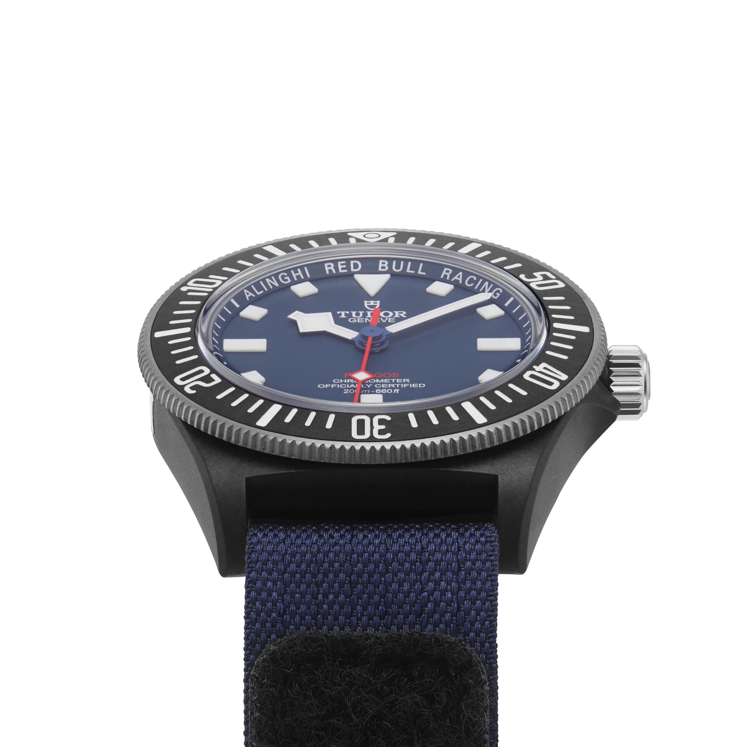 A close-up of the TUDOR Pelagos FXD, featuring a blue dial in a black case with a blue fabric strap—engineered for waterproof performance and precise underwater navigation.
