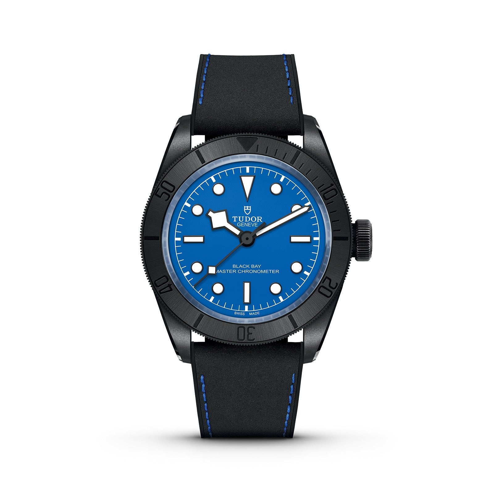 A TUDOR Black Bay Ceramic Blue wristwatch with signature snowflake hands, a blue dial, black bezel, and black strap with blue stitching, shown against a white background.
