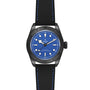 The TUDOR Black Bay Ceramic Blue showcases a blue dial, black bezel, and a black rubber strap with blue stitching, accented by signature Snowflake hands—all presented on a white background.