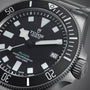 Close-up of a TUDOR Pelagos Ultra dive watch highlighting the dial, bezel, and date window at 3 o’clock.