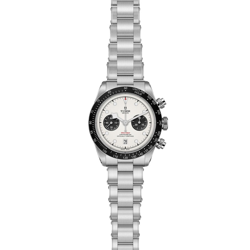 The TUDOR Black Bay Chrono is a stainless steel chronograph wristwatch featuring a white dial, black bezel, and metal bracelet.