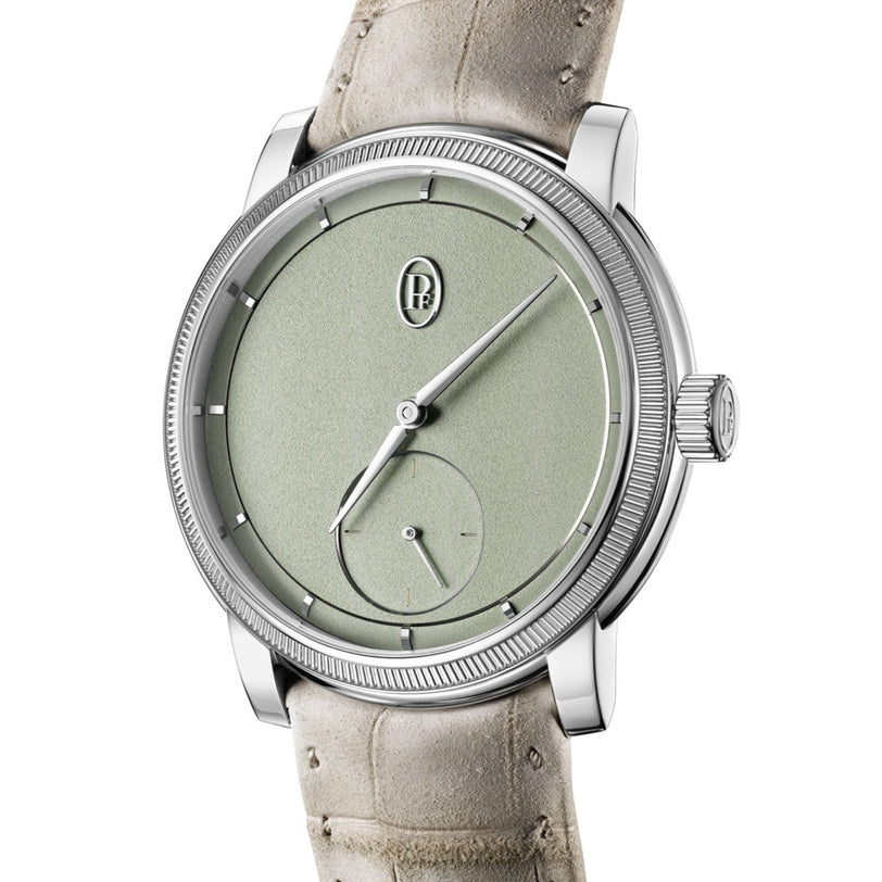 The Parmigiani Fleurier TORIC Petite Seconde is a luxury wristwatch with a light green dial, beige leather strap, and minimalist hour markers.