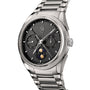The Parmigiani Fleurier TONDA PF Gregorian Annual Calendar is a luxury silver wristwatch featuring a textured black dial, multiple subdials, and a moon phase display.