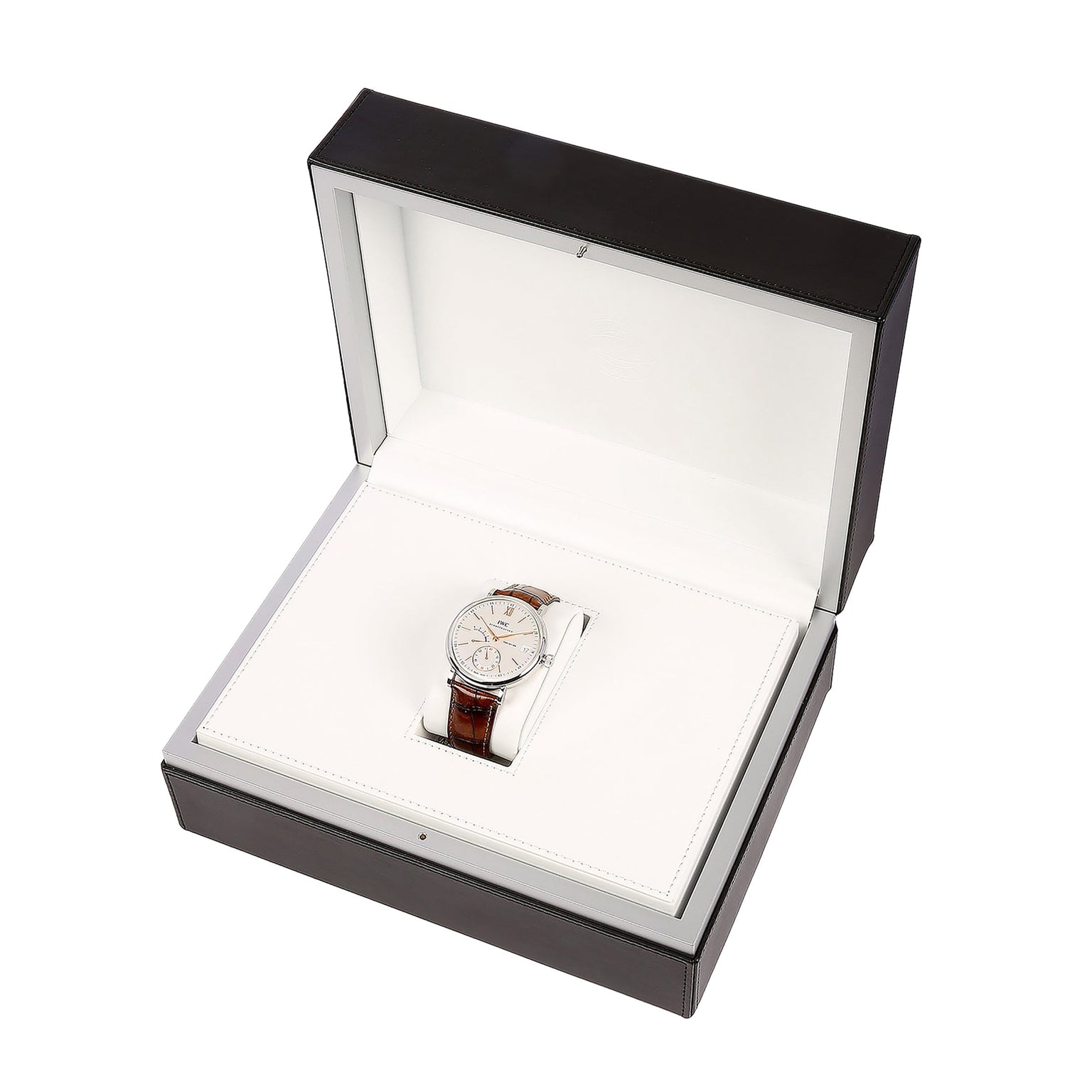 The IWC Schaffhausen Portofino Hand-Wound Eight Days wristwatch features a white dial, brown leather strap, IWC-manufactured calibre, and is presented in an open black and white box.