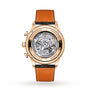 Back view of the IWC Schaffhausen Portugieser Chronograph displays its mechanical movement through a transparent case, highlighting precision timekeeping and paired with a brown leather strap.