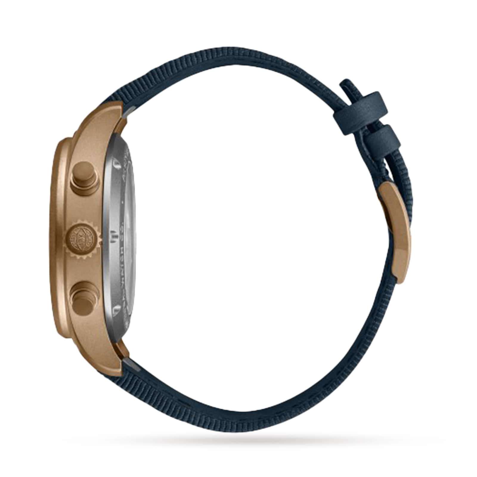 Side view of the IWC Schaffhausen Pilots Watch Chronograph 41, featuring a bronze case, two push buttons, a dark blue textured strap, and a beige buckle.