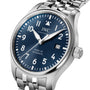 Close-up of the IWC Schaffhausen Pilots Watch Mark XX, an aviation timepiece with a blue dial, white numerals, stainless steel bracelet, and date set to the 25th.