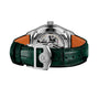 The IWC Schaffhausen Portugieser Perpetual Calendar 42 features haute horlogerie craftsmanship, a green leather strap, open case back showcasing the mechanical movement, and “IWC Portugieser” engraved on the case.