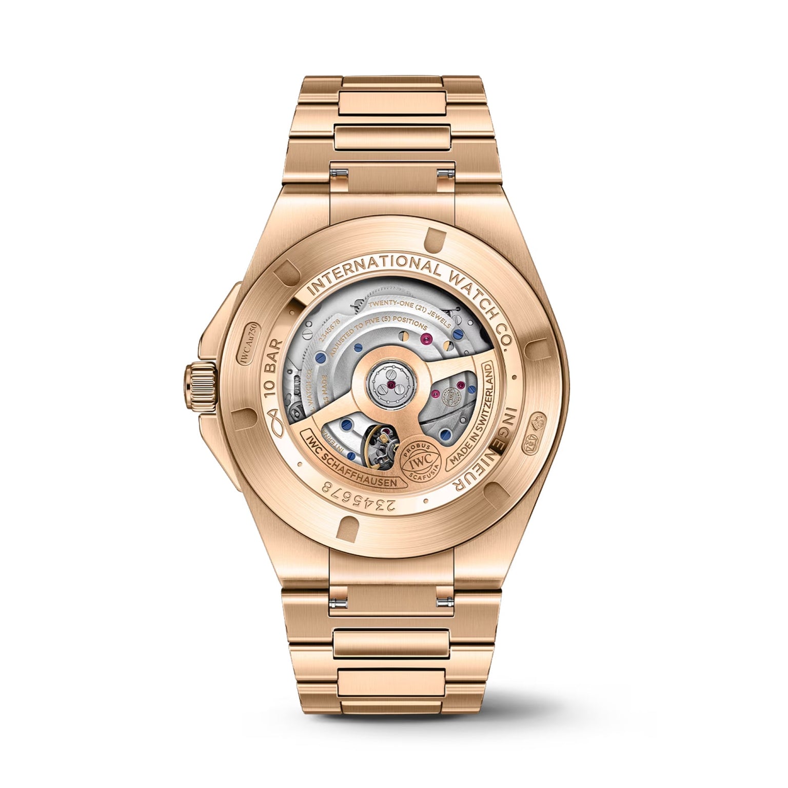 The image shows the back of the IWC Schaffhausen Ingenieur Automatic 40, crafted in 18-carat gold, with a transparent case displaying its internal mechanical movement and intricate components.