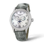 The Patek Philippe Complication 4948G-010 is a luxury watch featuring a diamond bezel, moon phase dial, and gray alligator leather strap.