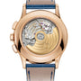 Close-up of the Patek Philippe Complications 5905R-010’s back, highlighting its exposed mechanical movement and gold rotor.