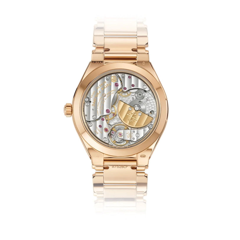 The Patek Philippe Twenty~4 7340/1R-001 wristwatch in rose gold features a transparent case back that reveals its intricate mechanical movement and gears.