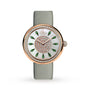 The Jacob & Co Brilliant luxury watch features a gray strap, diamond bezel, white face, and green gem hour markers.