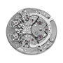 Close-up of the Armin Strom Mirrored Force Resonance Manufacture Edition Blue watch movement, showcasing its visible gears, screws, and purple jewels.