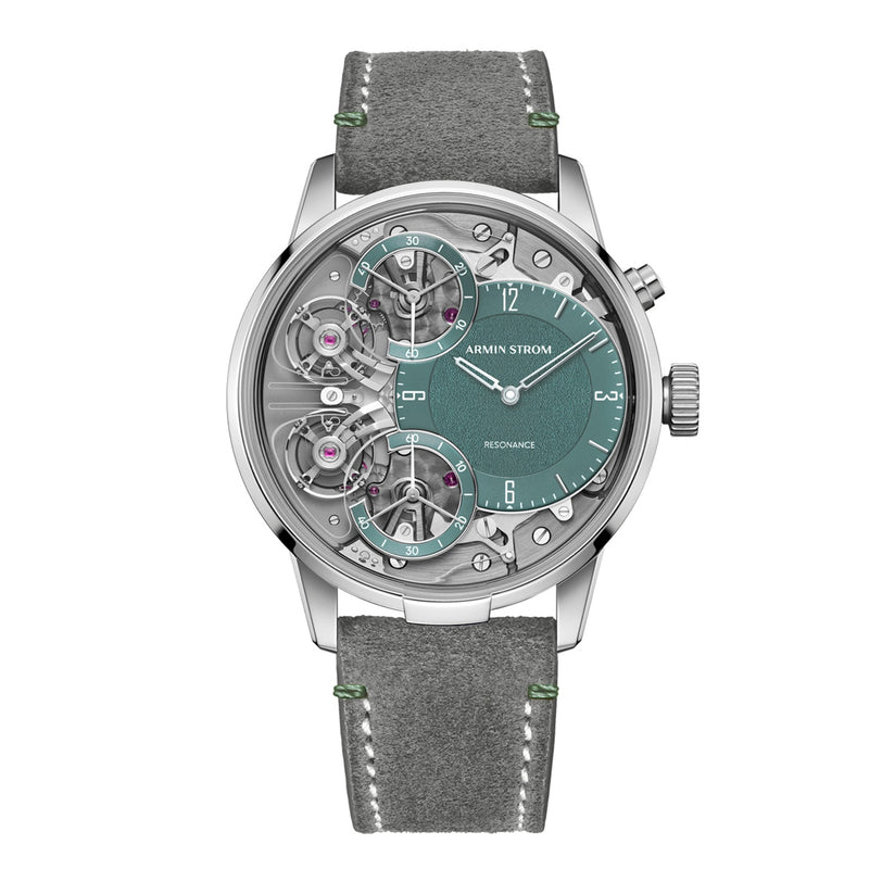 The Armin Strom Mirrored Force Resonance Manufacture Edition Green features a silver case, green dial with visible gears, and a grey leather strap.