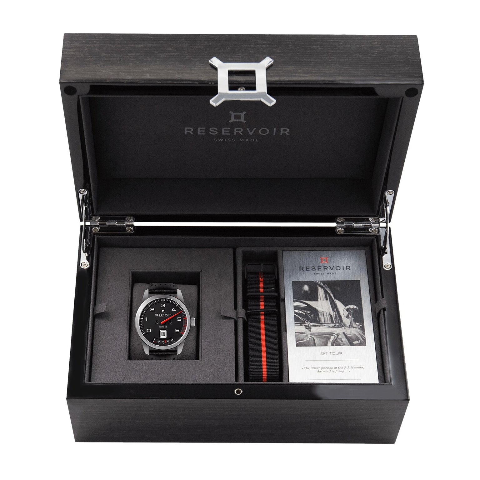 The Reservoir GT Tour box set includes a GT Tour watch, an extra strap, and a booklet, all neatly arranged in a black case.