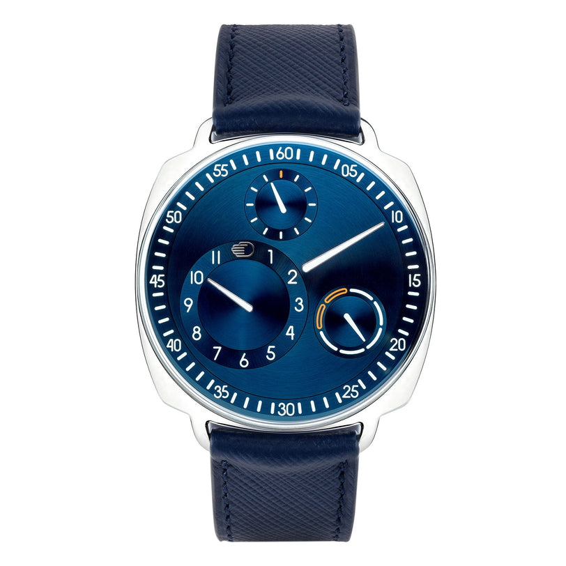 The Ressence TYPE 1² Squared Navy is a modern wristwatch with a blue dial, leather strap, unique subdials, and white numerals.