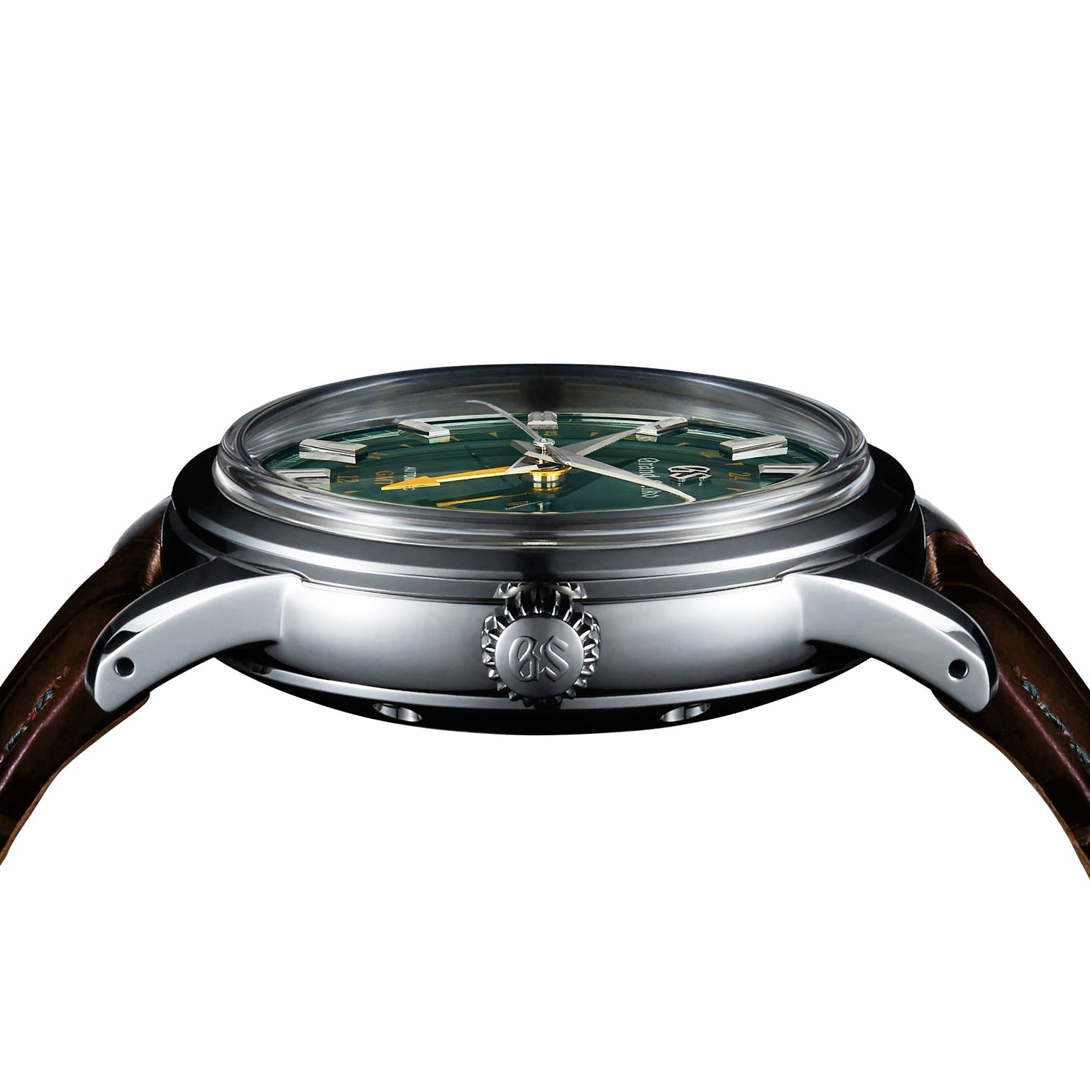 Side view of the Grand Seiko Automatic GMT Elegance wristwatch with a British Racing Green dial, silver case, visible GS-marked crown, and brown leather strap.