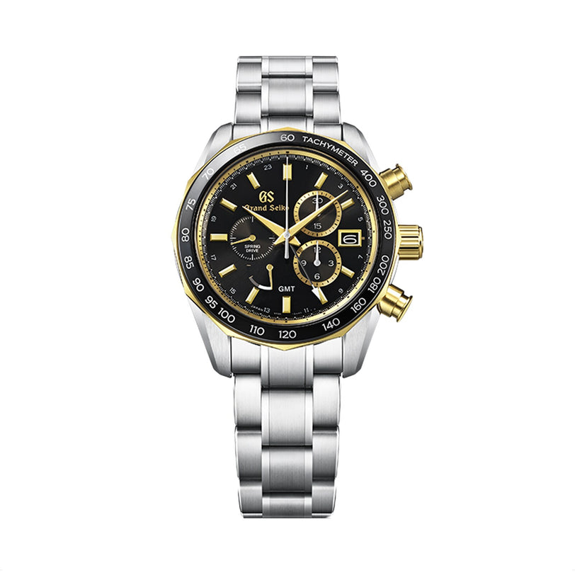 The Grand Seiko Spring Drive Chronograph Sport features a silver metal band, black dial with gold accents, chronograph sub-dials, and date display—crafted for precision and timeless style.
