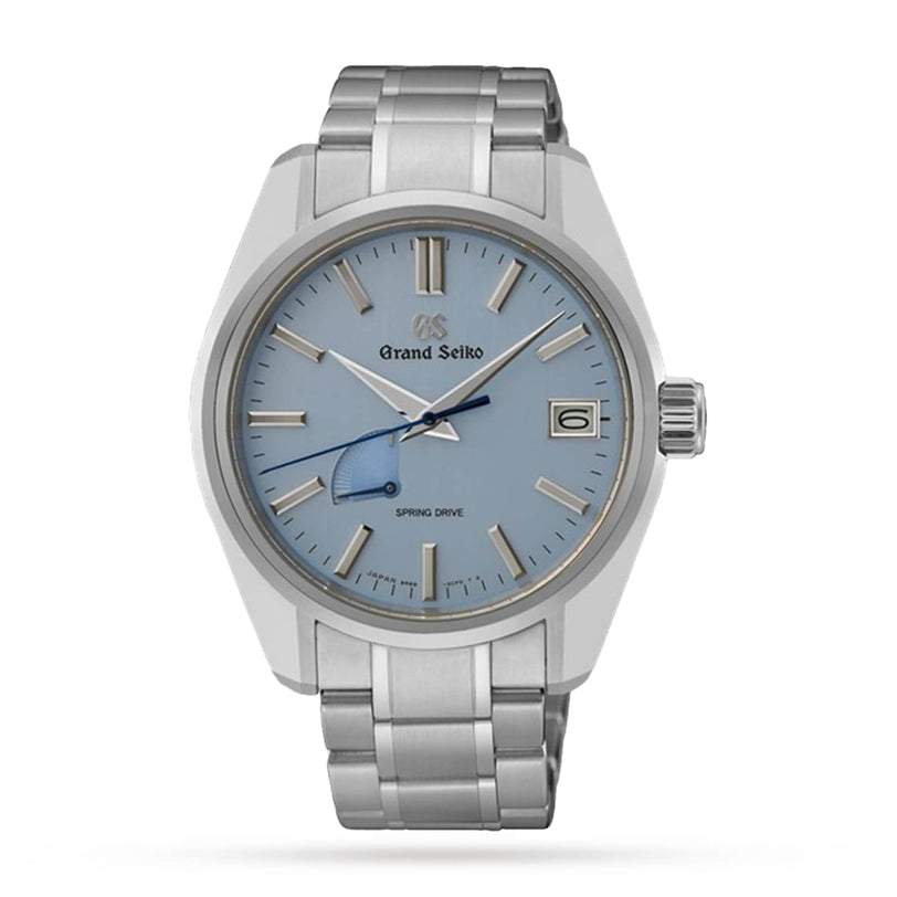 The Grand Seiko Spring Drive Heritage features a 44GS case, silver metal band, light blue dial with date at 3 oclock, and silver markers and hands finished with exquisite Zaratsu polishing.