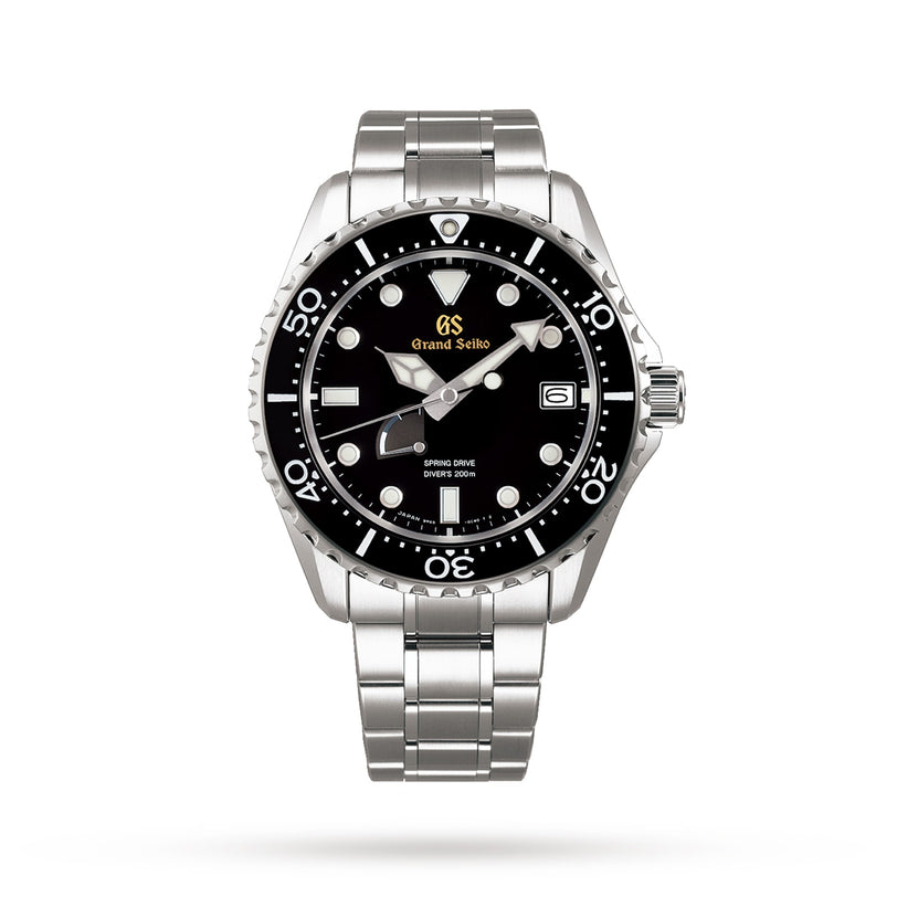 The Grand Seiko Spring Drive Sport is a stainless steel dive watch with black bezel and dial, superb legibility, date window at 3 o’clock, and silver bracelet, shown on a plain white background.