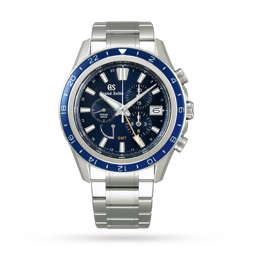 The Grand Seiko Spring Drive Chronograph Evolution 9 features a blue bezel and dial, three subdials, date window, and stainless steel bracelet, displayed against a white background.