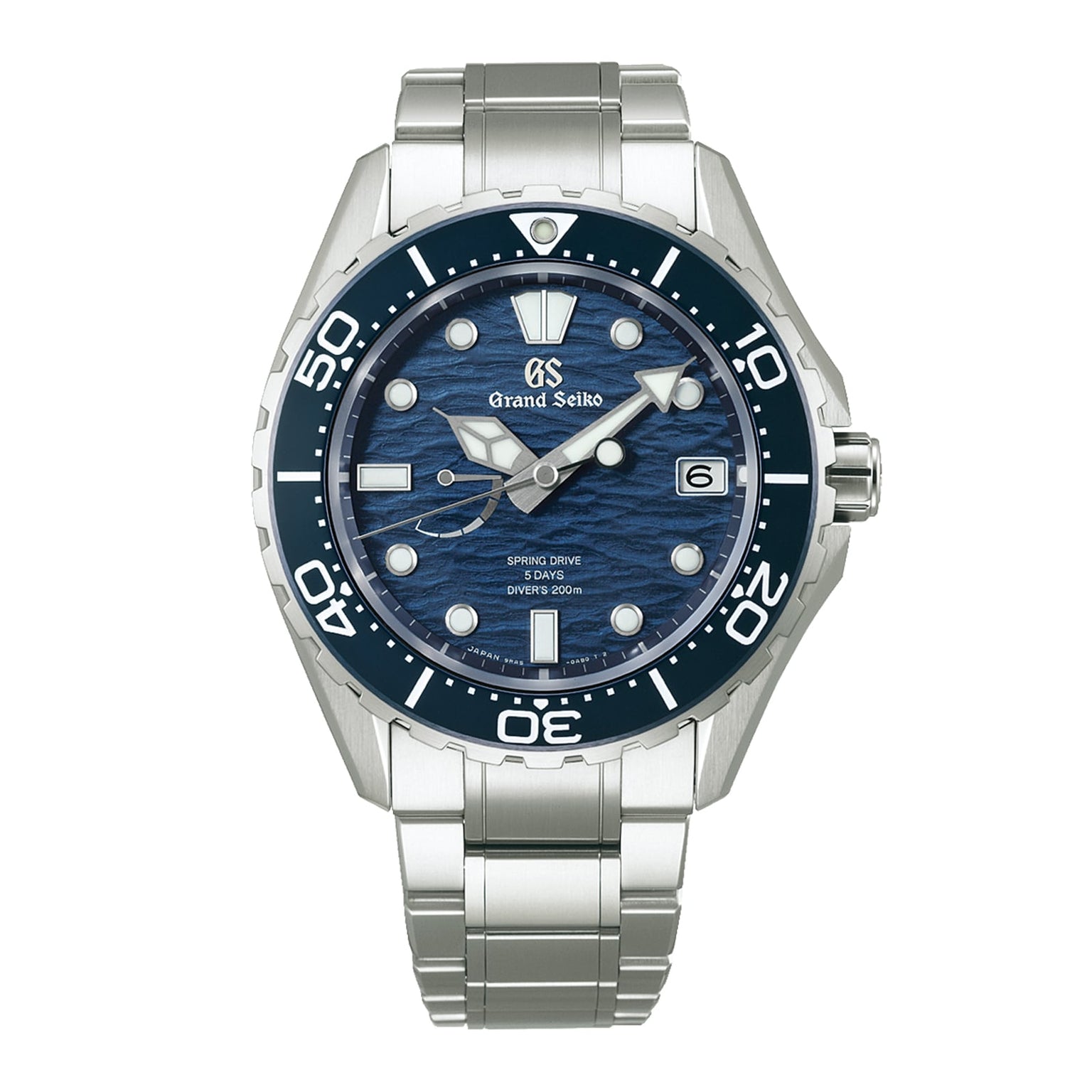 The Grand Seiko Spring Drive 5 Days Evolution 9 dive watch features a blue wave-patterned dial, silver hour markers, a date window at 3 o’clock, and a durable high-intensity titanium bracelet.