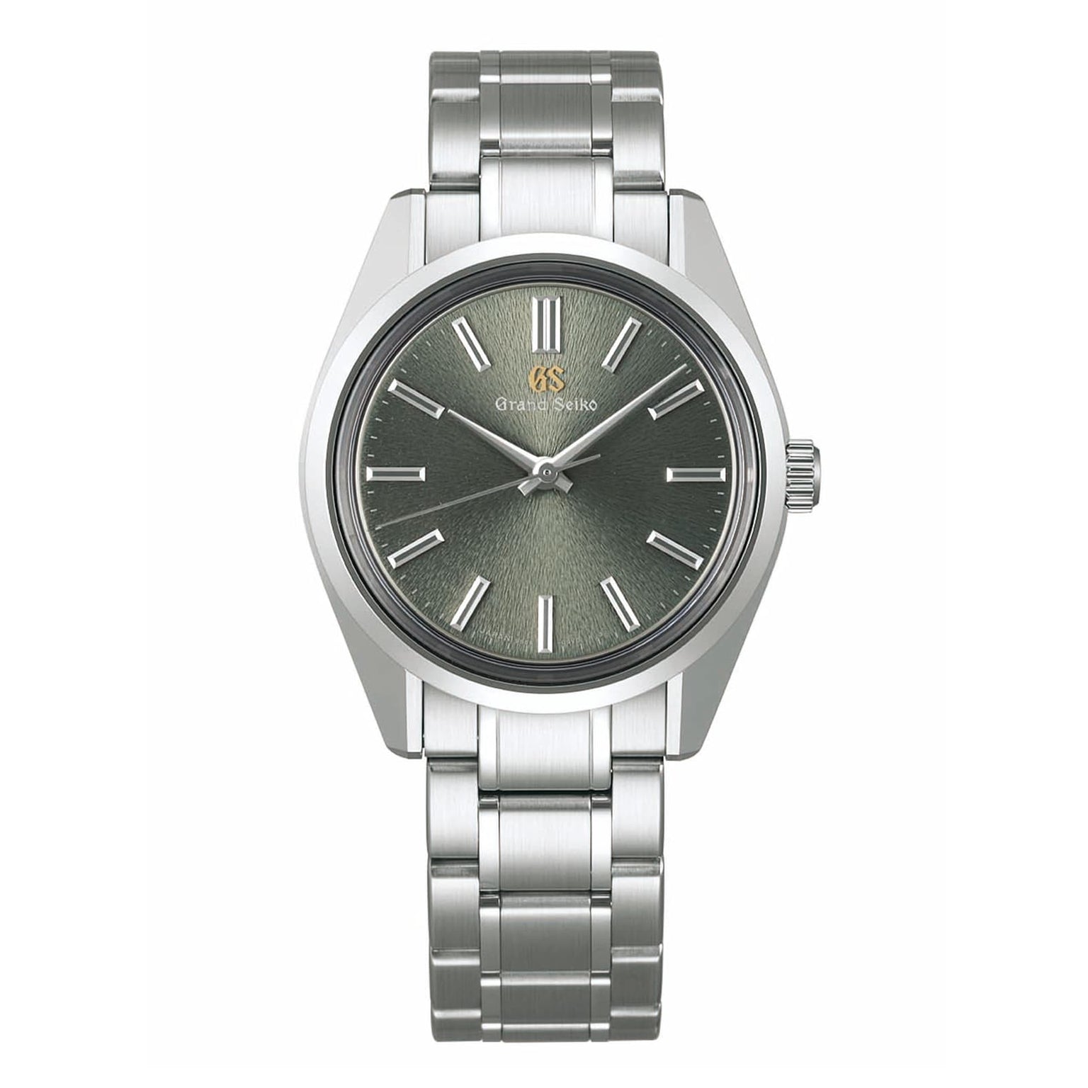 The Grand Seiko Manual Heritage wristwatch features a textured gray dial, silver hour markers, and a sleek metal bracelet, showcasing exquisite craftsmanship from the Heritage Collection.