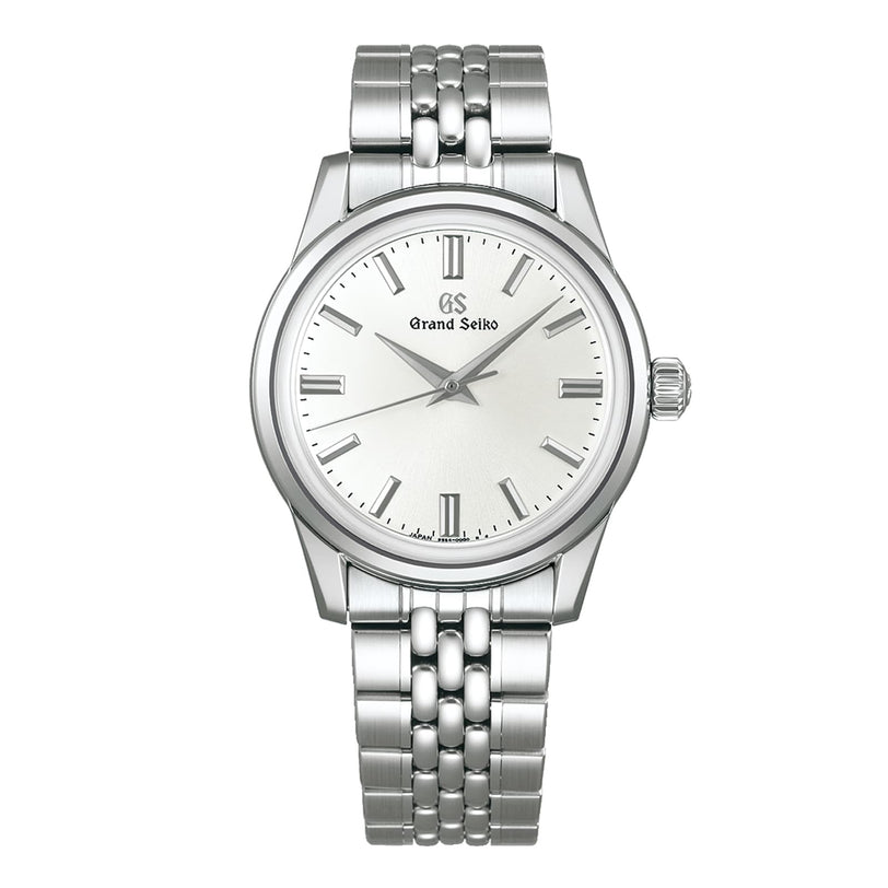 The Grand Seiko Spring Drive Elegance features a silver dial, silver markers and hands, a stainless steel bracelet, and scratch-resistant sapphire glass.