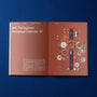 Open HODINKEE Magazine, Volume 9 by Hodinkee to an article on the IWC Portugieser Perpetual Calendar 42, featuring watch components displayed on a red page—an ideal read for horology and fine timekeeping enthusiasts.