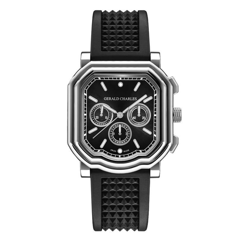 The Gerald Charles Maestro 3.0 Chronograph is a black and silver stainless steel watch with a rectangular face, three subdials, geometric markers, and a textured black rubber strap.