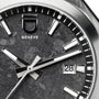 Close-up of the ID Geneve Circular 1 - Mineral Black watch face, featuring silver markers, textured black dial, and date window displaying 28.