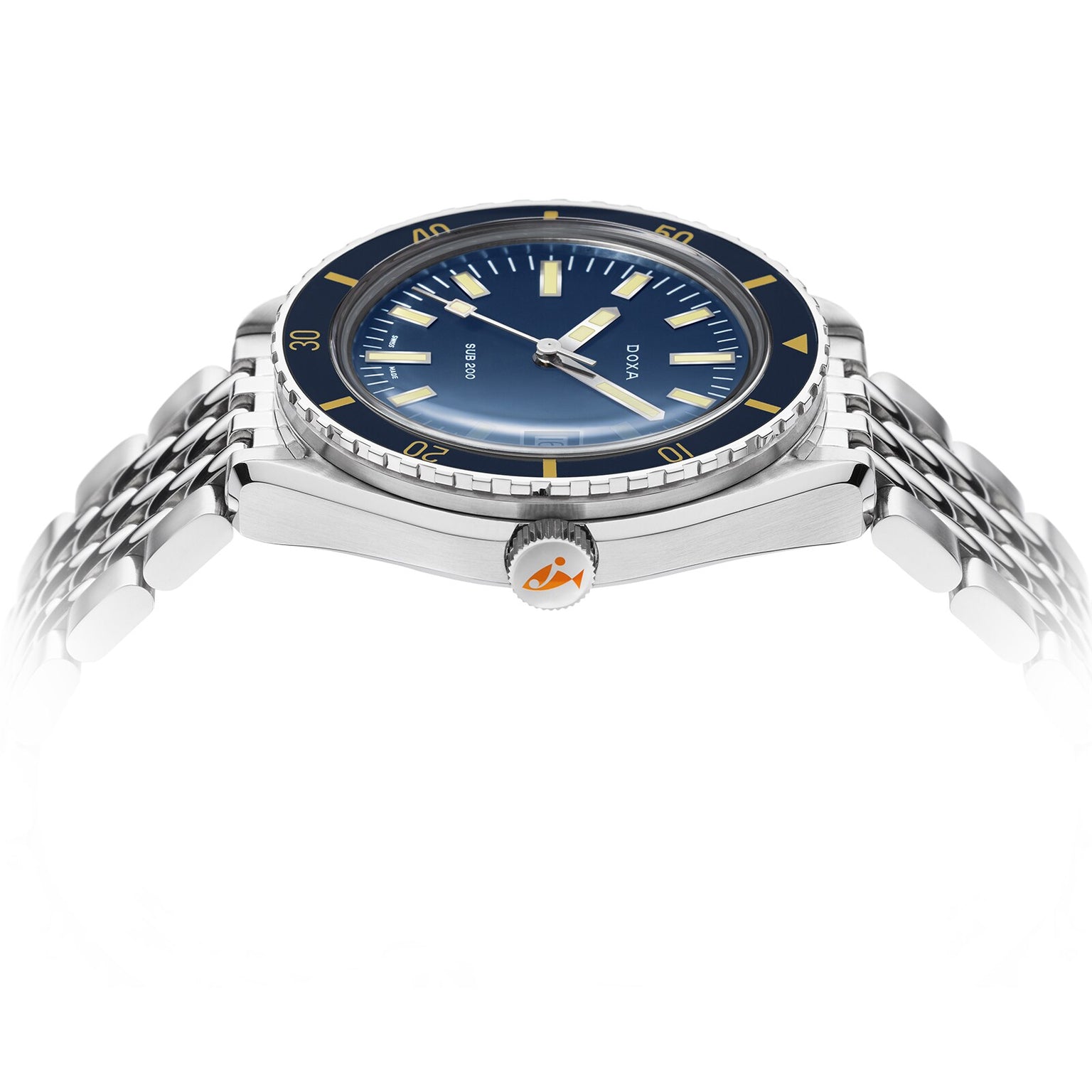 The DOXA Sub 200 Caribbean, a 316L stainless steel diver’s watch with a blue dial, yellow markers, and silver link bracelet, is shot from a low side angle to highlight its unidirectional rotating bezel.