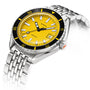 The DOXA Sub 200 Divingstar is a 316L stainless steel diver’s watch featuring a bright yellow dial, silver hour markers, and a date window at 3 o’clock, shown here on a metal bracelet.