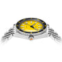 The DOXA Sub 200 Divingstar, a 316L stainless steel divers watch with a bright yellow dial, black bezel, and silver bracelet, is displayed from a low angle against a white background.