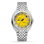 The DOXA Sub 300T Divingstar is a stainless steel diver’s watch with a bright yellow dial, date window at 3 o’clock, silver metal bracelet, automatic movement, and a helium release valve for reliable professional diving.