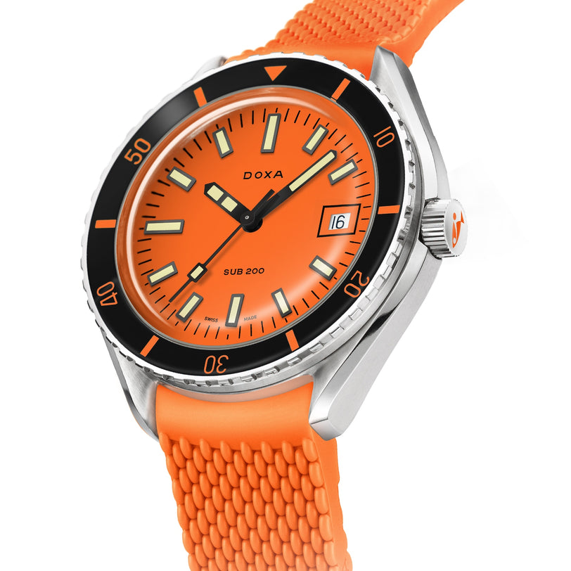 A close-up of the DOXA Sub 200 Professional featuring an orange dial, unidirectional bezel, orange rubber strap, 316L stainless steel case, and a date window at 3 o’clock.