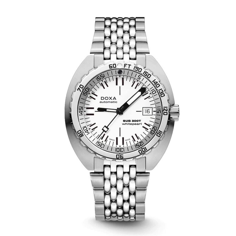 A DOXA Sub 300T Whitepearl diver’s watch with a white dial, black markings, date window at 3 o’clock, and a metal link bracelet is shown face up.