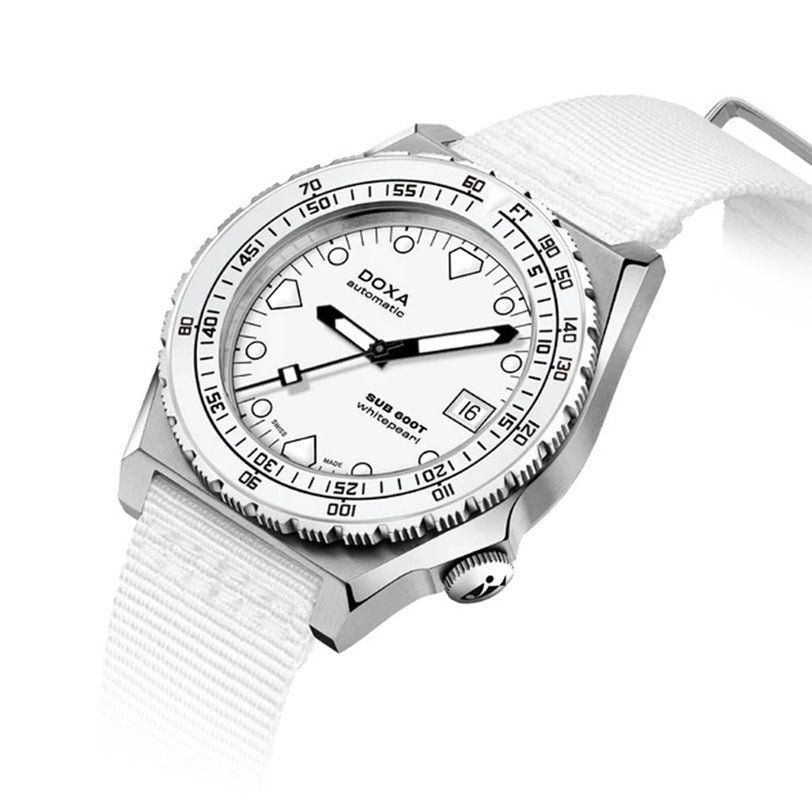 A DOXA Sub 600T Whitepearl diver’s watch with a white dial, white strap, and silver rotating bezel is shown at an angle on a white background.