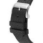 Close-up of a black textured leather watch strap with a silver buckle engraved Louis Erard, featured on the Le Régulateur Louis Erard x Massena LAB Gold.