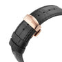 A chocolate leather watch strap from William Wood’s Chivalrous Collection with a rose gold clasp engraved “William Wood.”.