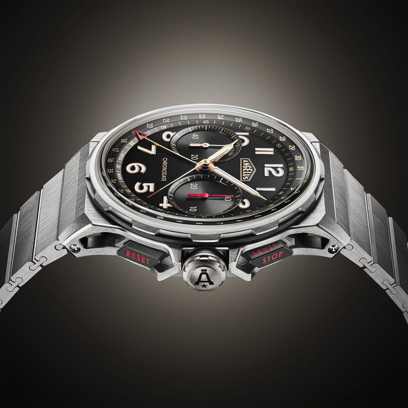 The Angelus Chronodate Titanium Black Titanium wristwatch features a black dial, gold accents, and chronograph functions, showcased against a dark gradient background.