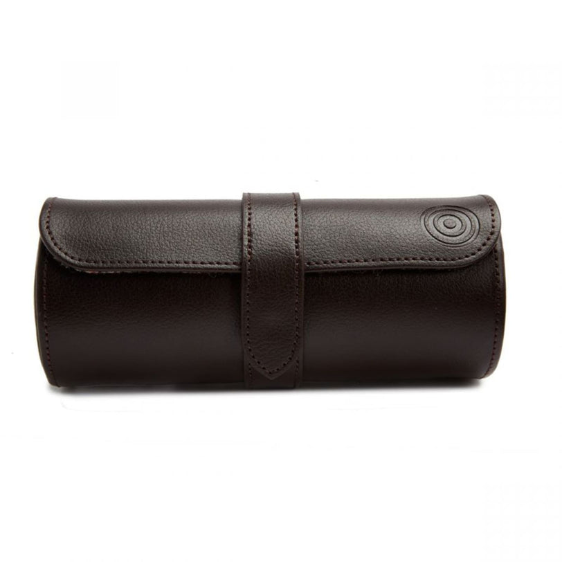 The WOLF WM Brown Watch Roll with Cigar Case is a brown leather cylindrical case featuring a strap and snap button closure.